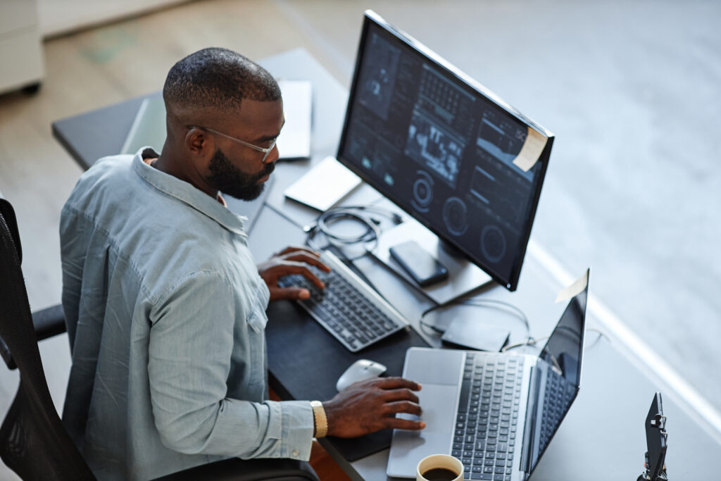 Software Developer working on his desk
